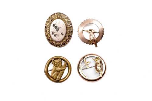 Four vintage brooches, one 9ct front, other rolled gold