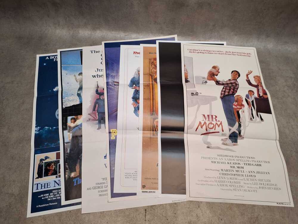 Eight vertical insert posters