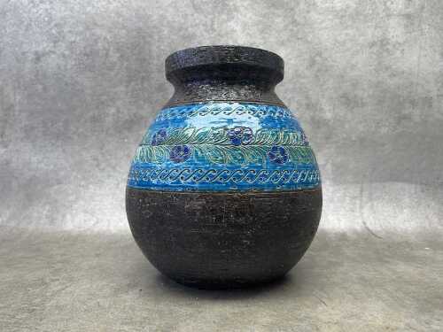 A Bitossi mid-century ceramic vase with flower and leaves design.