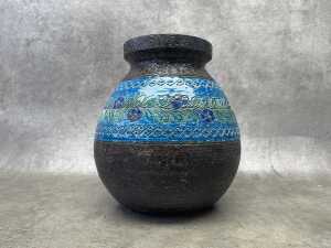A Bitossi mid-century ceramic vase with flower and leaves design.