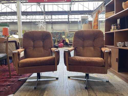 Pair of mid century swivel chairs