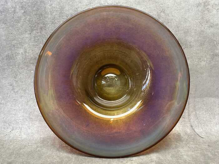 An iridescent glass bowl