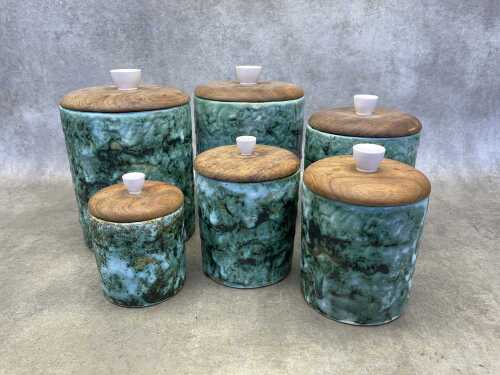 Set of six mid-century green lave glaze kitchen canisters
