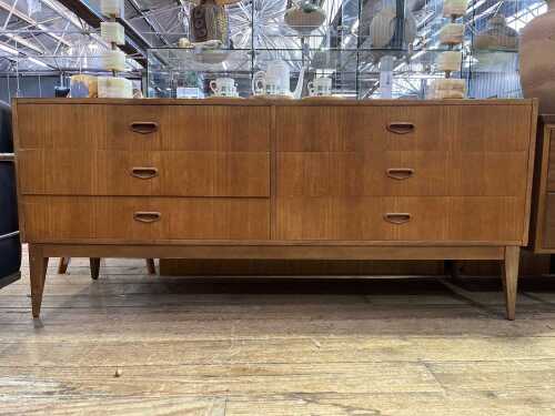 A mid-century teak dressing table
