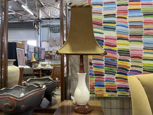 A vintage cream pottery lamp