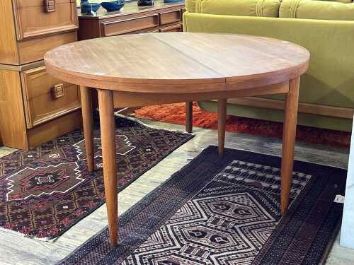 Mid-century round teak dining table