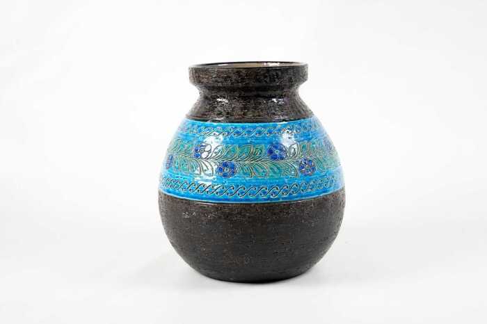 A Bitossi mid-century ceramic vase with a flower and leaves design.