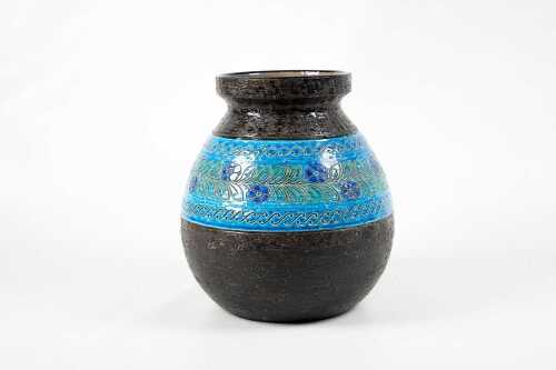 A Bitossi mid-century ceramic vase with a flower and leaves design.
