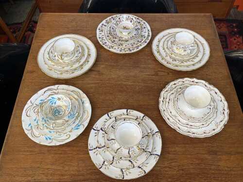 Six English porcelain trio, side and dinner plate sets