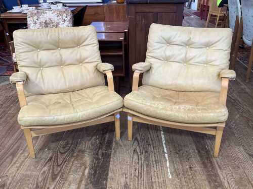 Pair of Ingrid lounge chairs By Bruno Mathsson for Dux Sweden