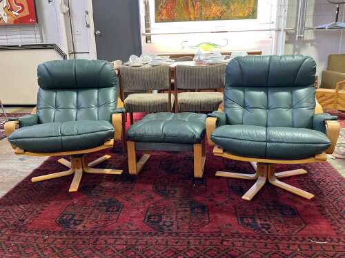 Pair of Tessa swivel armchairs, together with footstool