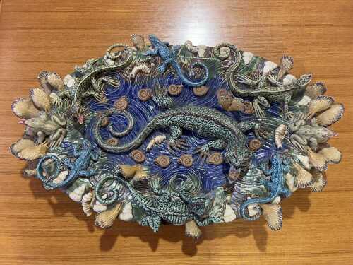 A ceramic 3D Palissy style platter of lizards and shells