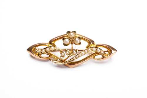 An antique seed pearl brooch in 15 carat yellow gold.
