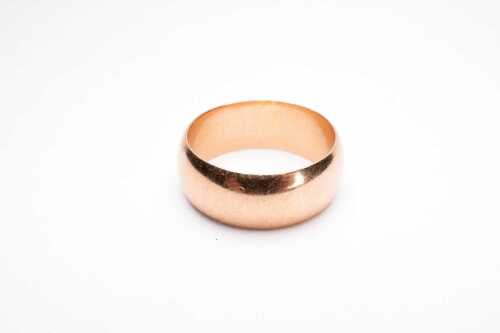 A half round wedding band in 9 carat rose gold.