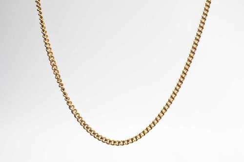 A curb link necklace in 9 carat yellow gold.