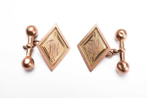 A pair of antique cufflinks in 9 carat rose gold.