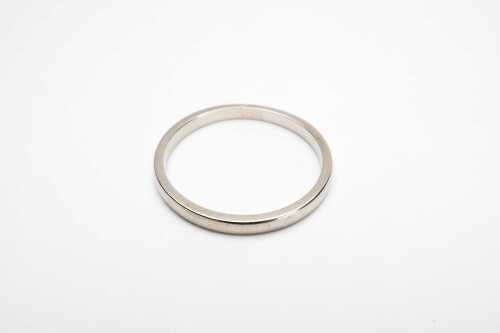 A vintage wedding band in 18 carat white gold.