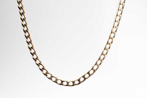A curb link necklace in 9 carat yellow gold.