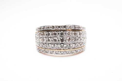 A diamond ring in 10 carat yellow gold.