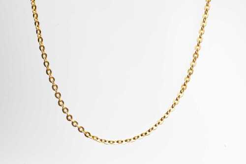 A trace link necklace in 14 carat yellow gold.