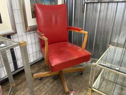 A mid-century maple swivel desk chair