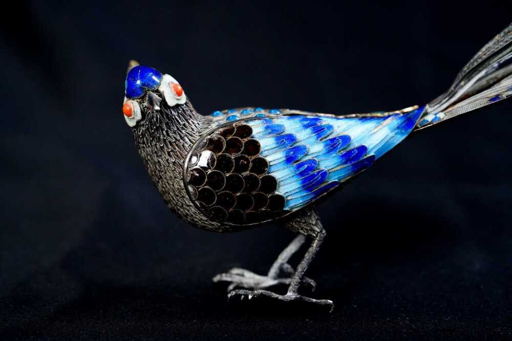 Silver enamelled filigree bird figure