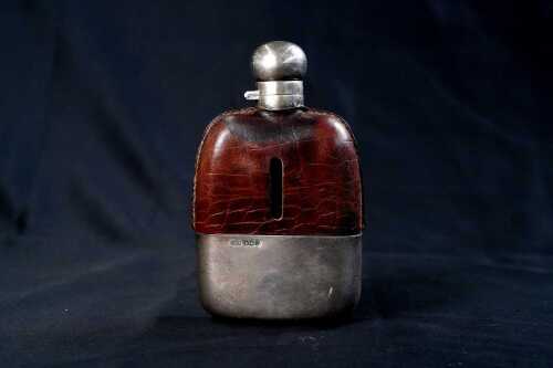 English sterling silver mounted hip flask by Hardy Brothers, hallmarked Sheffield 1931/32