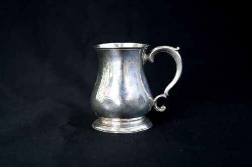George II English sterling silver baluster form christening mug, 1746