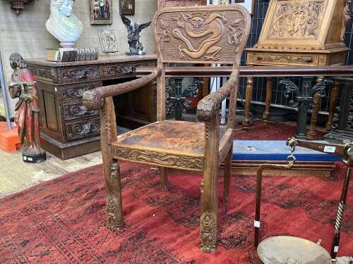 Antique Asian hand-carved timber armchair