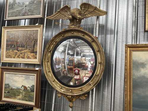 Antique Empire-style convex glass wall mirror