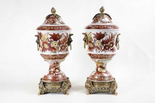 Pair of porcelain urns with gilt metal mounts