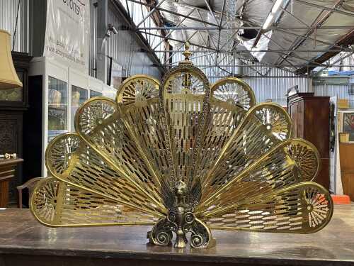 Empire-style brass peacock fire screen