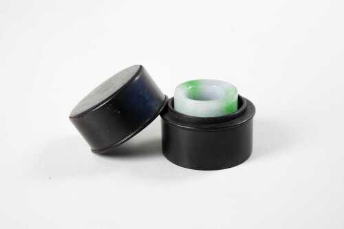Jade Archer's ring in timber case