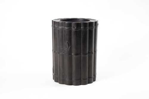 A bamboo-shaped timber brush pot