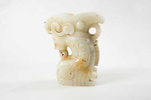 Carved stone figure candle holder