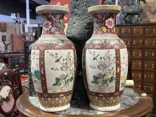 A pair of red-ground famille rose 'Bang Chui' vases with four season flowers
