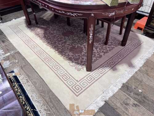 Oriental rug in cream and pink