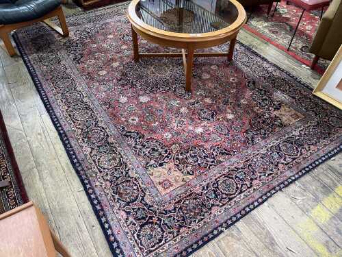 Pink blue and cream rug