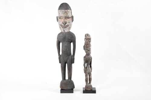 Two Papua New Guinea spirit figures mounted on stone bases