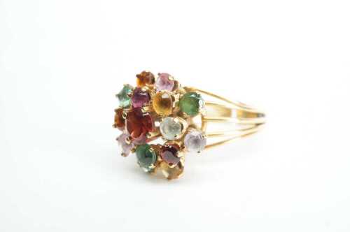 A vintage multi coloured quartz cluster ring in 18ct yellow gold.