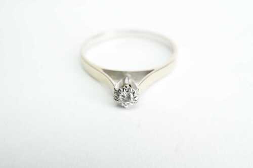 A diamond solitaire ring in 18ct white gold.