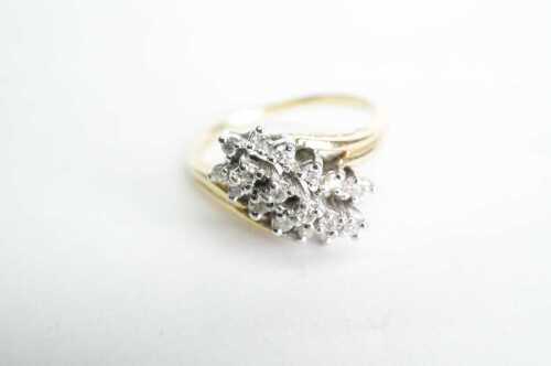A vintage diamond cluster ring in 14ct yellow gold and platinum.