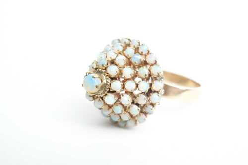 A vintage opal cocktail ring in 12ct yellow gold.