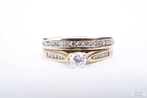 A diamond ring set in 9ct yellow gold.