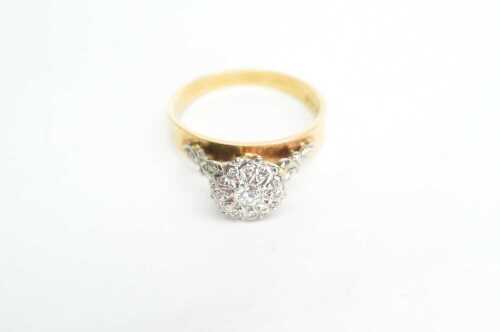 A vintage diamond cluster ring in 18ct yellow gold.