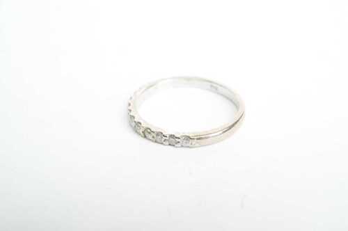 A diamond band in 18ct white gold.