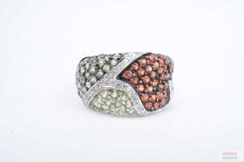 A diamond, green amethyst, orange and green sapphire ring in 14ct white gold.