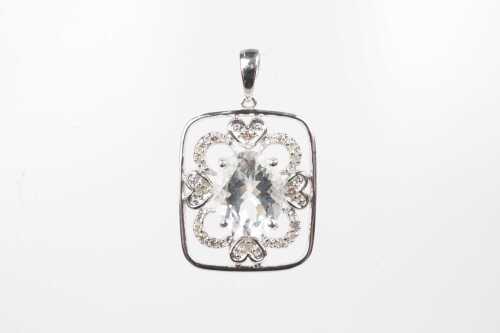 An aquamarine and diamond pendant in 14ct white gold.