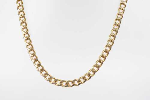 An Italian curb link necklace in 9ct yellow gold.