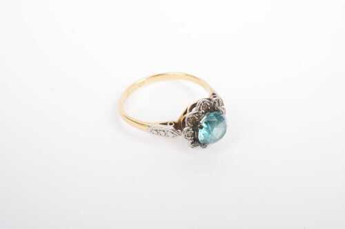 A blue topaz and diamond ring in 18ct and platinum.